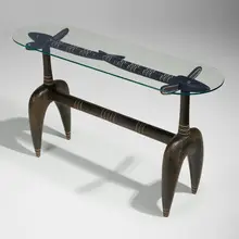 Gazelle console table by Judy Kensley McKie, 1987, carved, painted, and ebonized mahogany, glass, sold Sep 2026