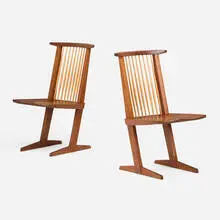 Conoid chairs, pair by George Nakashima, 1965, American black walnut, hickory, sold Sep 2026