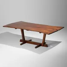 Exceptional Conoid dining table by George Nakashima, 1973, American black walnut, rosewood, sold Sep 2026