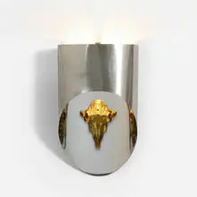 Totum sconce by Maria Pergay, c. 1974, mirror-polished stainless steel, gold-plated bronze, sold Jun 2021