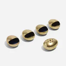 ashtrays, set of five by Hans Bunde, c. 1965, brass, enameled brass, sold Nov 2020