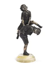 BOYS, DESIGNED CIRCA 1925 by Demetre Chiparus, silvered bronze, onyx base, sold Oct 2026