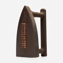 Cadeau by Man Ray, cast iron, steel tacks, sold Oct 2026