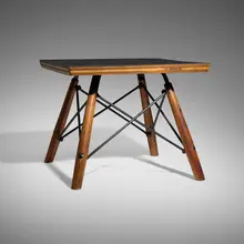 Rare experimental occasional table by Charles and Ray Eames, c. 1950, birch, laminate over plywood, enameled steel, sold Oct 2026