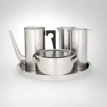 Five-piece Cylinda collection by Arne Jacobsen, 1967, stainless steel, Bakelite, sold Oct 2026