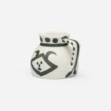 Pichet têtes by Pablo Picasso, 1953, white earthenware with oxidized paraffin decoration and enamel, sold Oct 2026