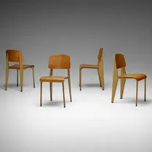 'Semi-Metal' chairs no. 305, set of four by Jean Prouvé, 1950, enameled steel, beech plywood, aluminum, rubber, sold Mar 2019