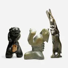 Collection of three carvings by Inuit, soapstone, hide, wood, shell, sold Aug 2021