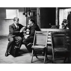 Untitled (Two Men in Conversation) by Jerry Stoll, gelatin silver print, sold Oct 2026