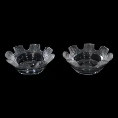 A pair of Lalique France St Nicholas Cherub Face Clear Frosted Glass Trinket Dishes Ash Trays by Lalique, H: 1 1/2” (4 cm) each<br> D: 4 1/2” (11 cm) each, sold Oct 2026