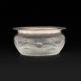 Arts & Crafts Cymric-mounted bowl, model 5562 by Jessie M. King, Bowl features a silver mount with fine enamel decoration of flowers and leave Impressed maker's mark and English hallmar, sold Oct 2026