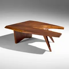 Conoid coffee table by George Nakashima, 1957, Solid slab top with three free edges and sap grain detail. Signed with client name to underside 'Dr Cook'. Sold with a d, sold Oct 2026