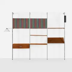 CSS (Comprehensive Storage System) by George Nelson & Associates, 1959, System comprises four uprights, two work surface tops, one drawer unit, one magazine display shelf, six shelves, two dro, sold Oct 2026