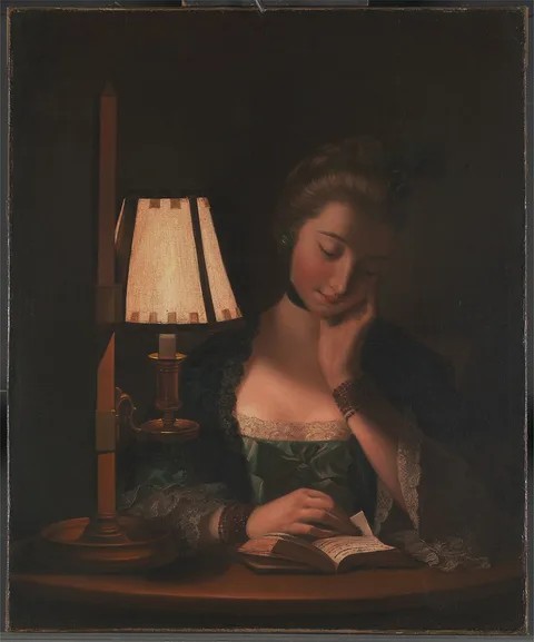 Henry Robert Morland, Woman Reading by a Paper-Bell Shade