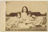 Lewis Carroll, Edith, Ina and Alice Liddell on a Sofa