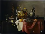 Pieter van Overschie, Still life with gilt beaker in a bowl of walnuts and a basket of fruit with other objects on a table