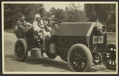 Fedele Azari, [Group portrait in car]