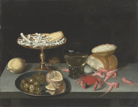 Francesco Codino, Figs, olives, and a quartered orange on a silver platter