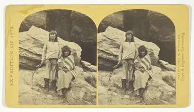 Timothy H. O'Sullivan, Navajo Brave and his Mother. The Navajo were formerly a warlike tribe until subdued by U.S. Troops, in 1859-60. Many of them now have fine flocks, and herds of horses, sheeps and goats, No. 29 from the series "Geographical Explorations and Surveys West of the 100th Meridian"