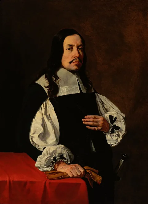 Vigor Boucquet, Portrait of a man standing by a table draped with a red cloth, holding his gloves