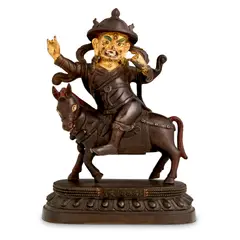 A Sino-Tibetan Parcel-Gilt-Bronze Figure Of Garwa Nagpo, Qianlong Mark And Of The Period, 18cm high